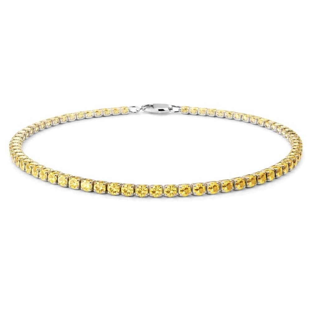 Тенис гривна от бяло злато с жълти диаманти